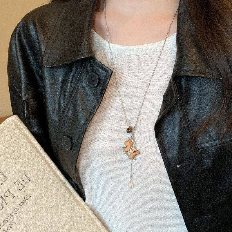 新款配饰复古年2026秋冬钢毛衣链项链吊坠女木质长款小马钛高级感