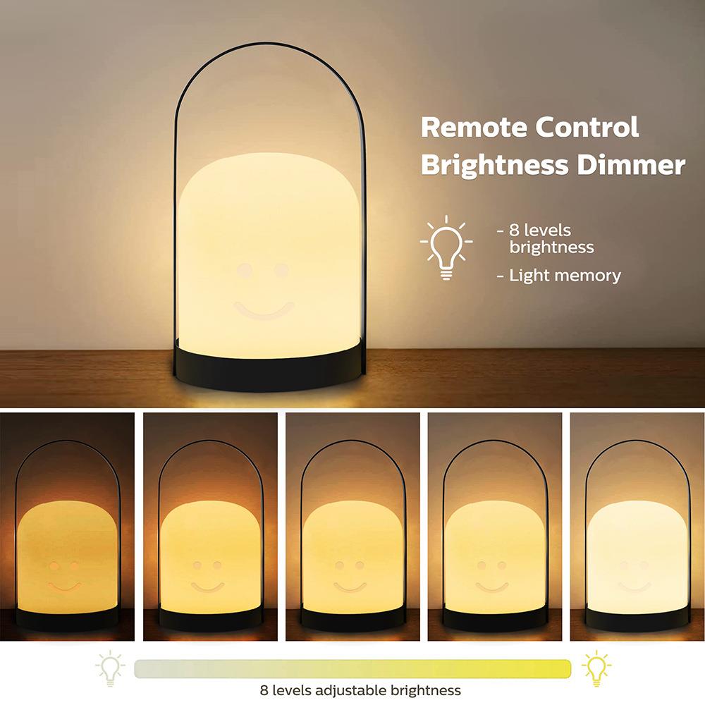 新款金属手提小夜灯创意桌灯笑脸圆柱遥控调光变色充电床头夜灯