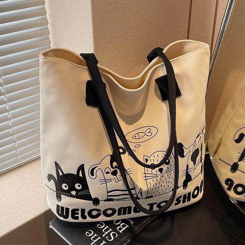 大容量卡通帆布包包2026新款休闲百搭单肩包手提学生通勤托特包Q,箱包皮具/热销女包/男包,托特包,淘宝优惠券,粉丝福利购,淘宝优惠卷