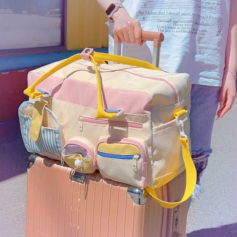 C2K大容量可爱轻便旅行包斜挎手提收纳袋高颜值便携女孩外出女生