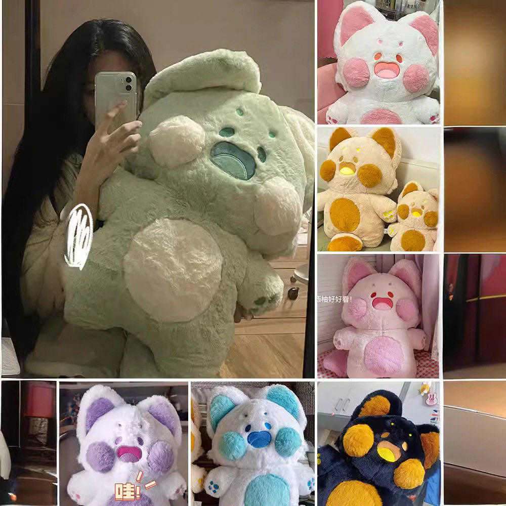 嘟嘟喵玩偶睡觉抱枕毛绒图片