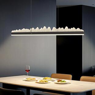 设计师新款饭厅灯吊灯2025年艺术雪山长条护眼岛台吧台灯广东中山