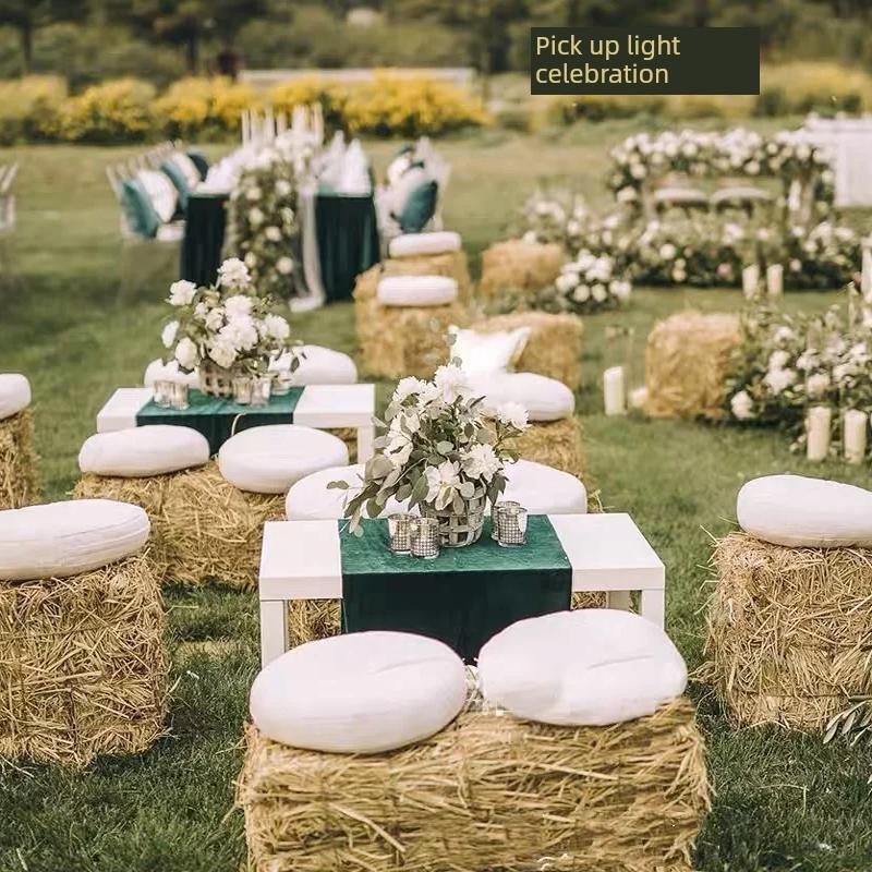 草干稻草堆叠凳子沙发形状烧烤野营风格景点装饰流行入住照片道具