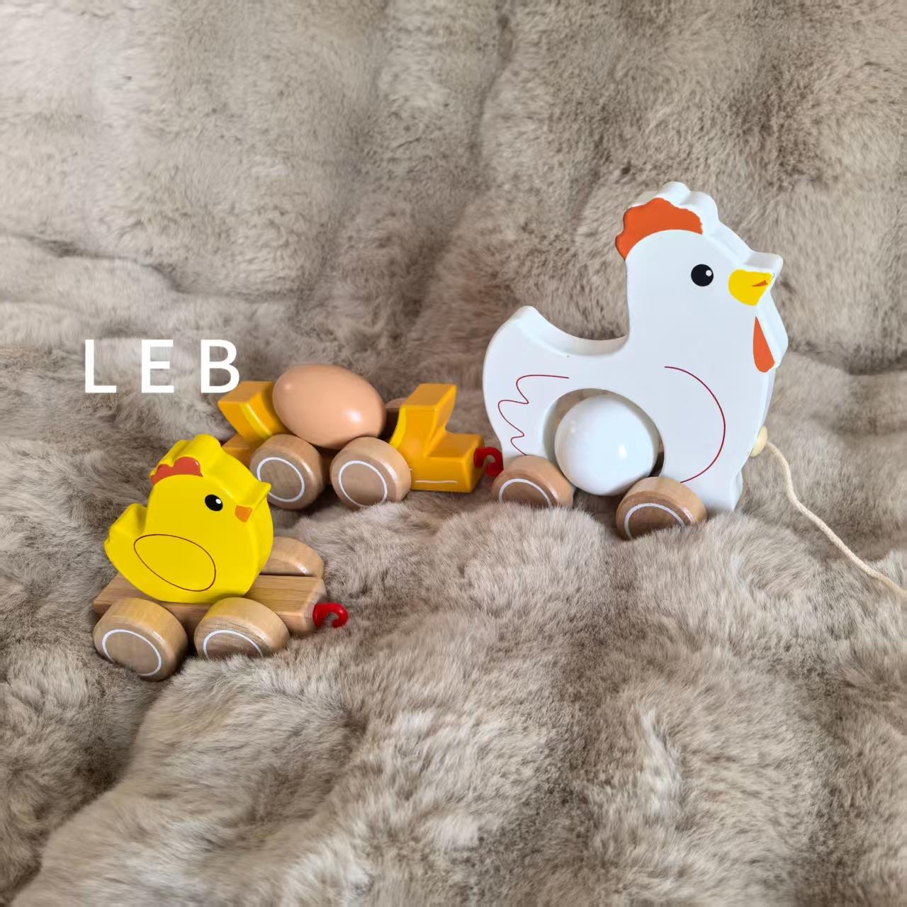 幼儿早教宝宝学步拉绳玩具拖拉车趣味小鸡学步车翻滚鸡蛋拉拉车