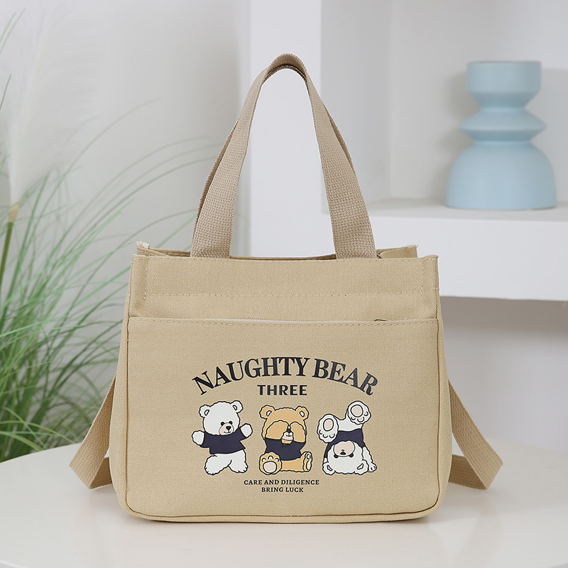 帆布手提包妈咪包卡通便携饭盒包简约通勤包女包带肩带百搭单肩包