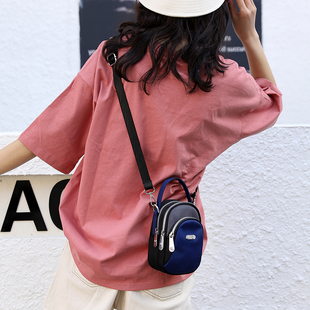 冬天小包包女斜挎2021新款潮百搭时尚迷你单肩随身牛津帆布手机包