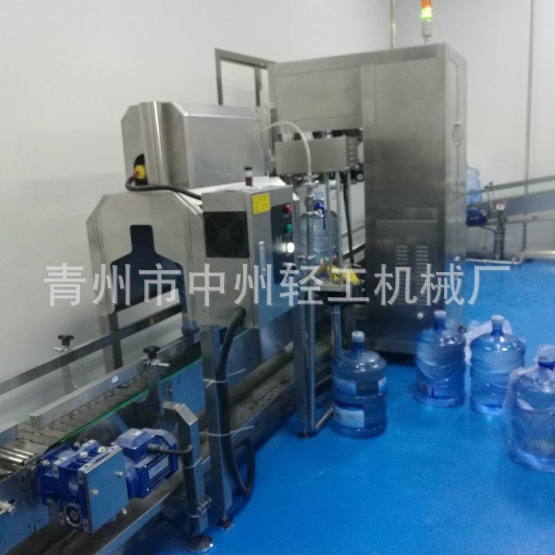 厂家供应桶装水自动套帽机 胶帽热缩机 全自动套帽胶帽热缩设备