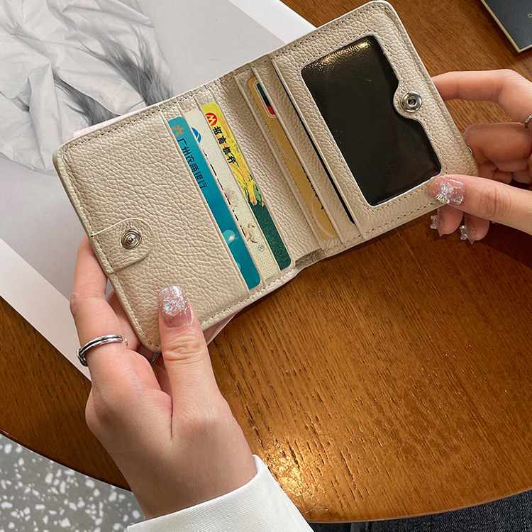 新款2025男女纯色车缝线短款钱包皮革二折钱包搭扣超薄多卡位钱包