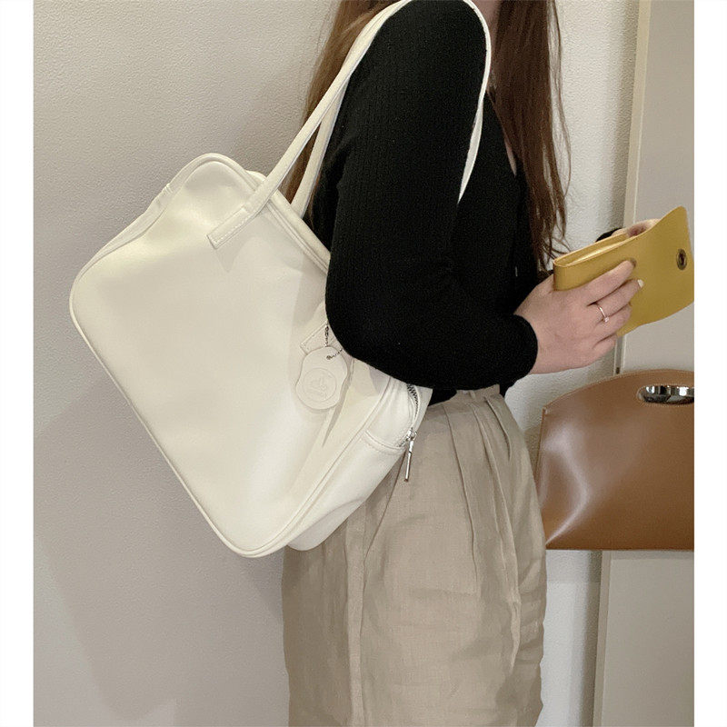 日韩新品复古软皮纯色拉链大容量单肩包通勤公文包休闲学院风女包