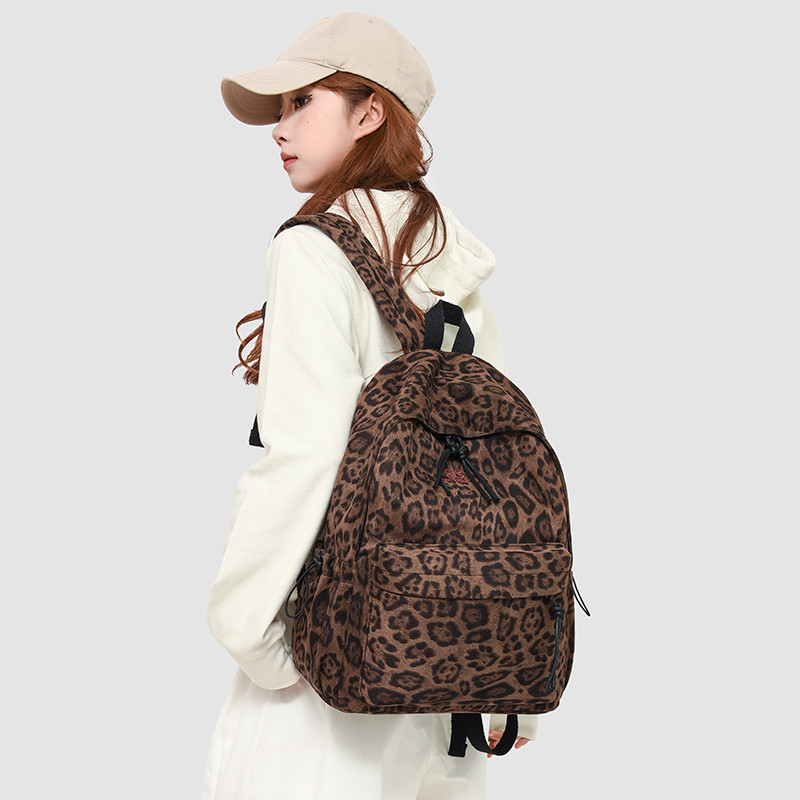 2025新款休闲学院风豹纹双肩包女大学生书包韩版大容量外出旅行包