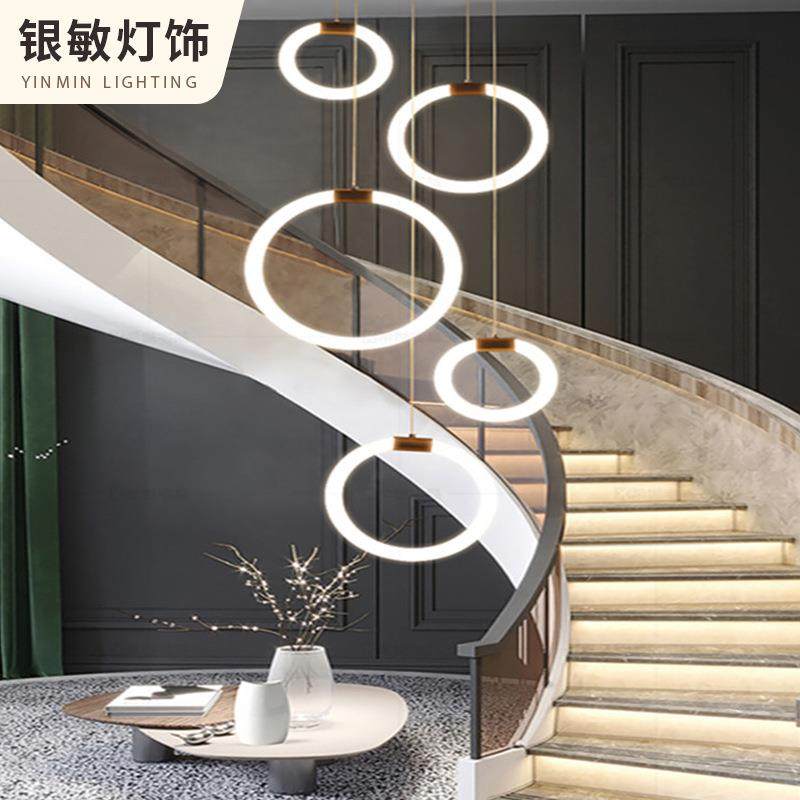 楼梯客厅复式长吊灯公寓别墅酒店现代简约拉环圆形北欧灯饰全屋