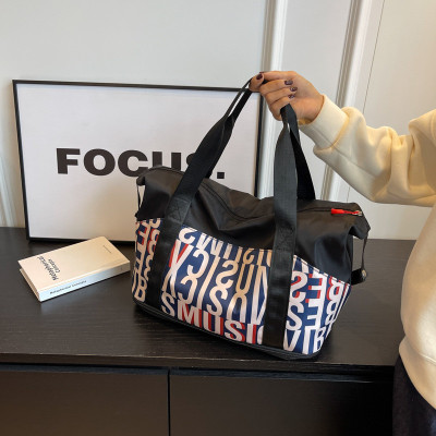 高颜值短途旅行包2025新款行李包女士外出旅游便携式收纳包大厂家