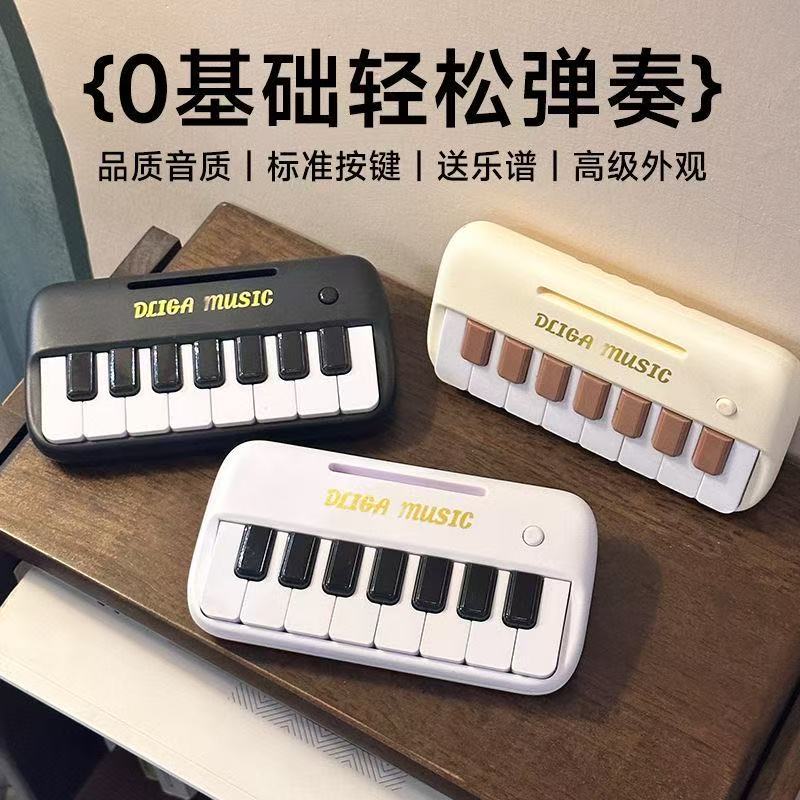 迷你口袋钢琴可弹奏儿童玩具入门小孩手拇指钢琴1到3岁启蒙教程