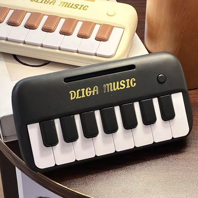 迷你钢琴可弹奏儿童音乐玩具入门小孩手指拇指钢琴1到3岁钥匙扣