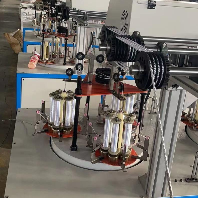 立式包芯绳机器手提绳机器