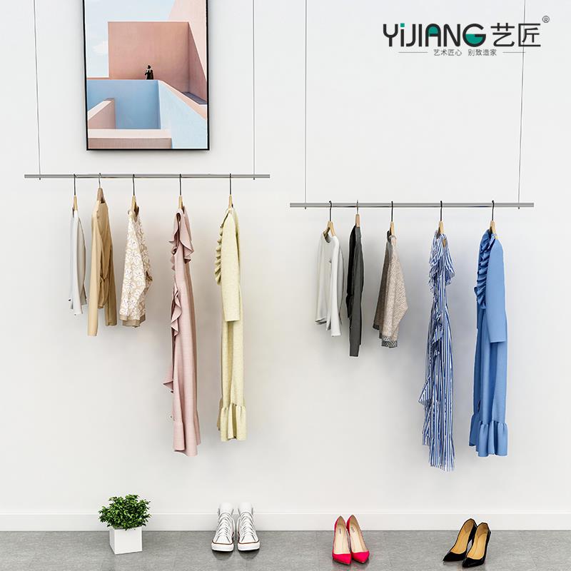 创意女装店高端服装店壁挂式展示陈列货架上墙专用不锈钢拉丝衣架图片