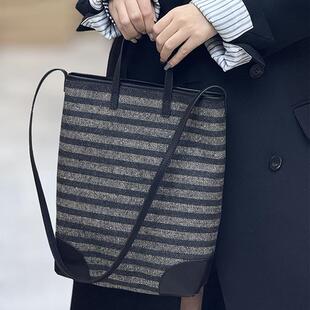 2025秋冬时尚松驰慵懒牛皮条纹设计大容量度假上班单肩斜挎水桶包