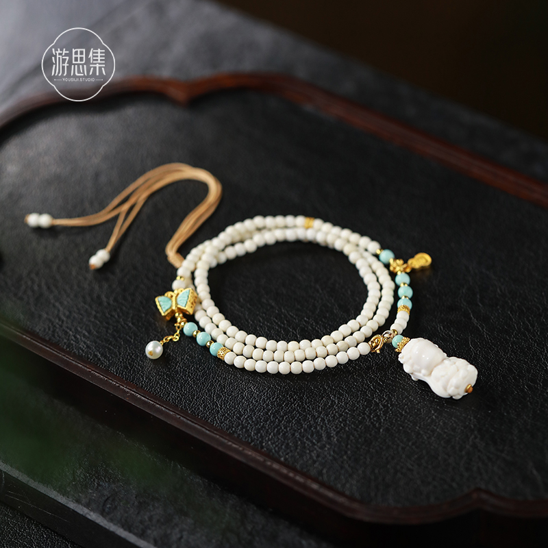 游思集冰料猛犸象牙项链高级感2025新款爆款斜挎链毛衣锁骨链原创