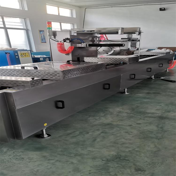 水滴形状拉伸膜真空包装机商用连续式真空封口机小型包装玉米设备