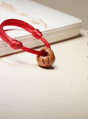 天然野生桃核红绳手錬可调节婴儿童宝宝护身压惊龙纹桃篮手工打磨