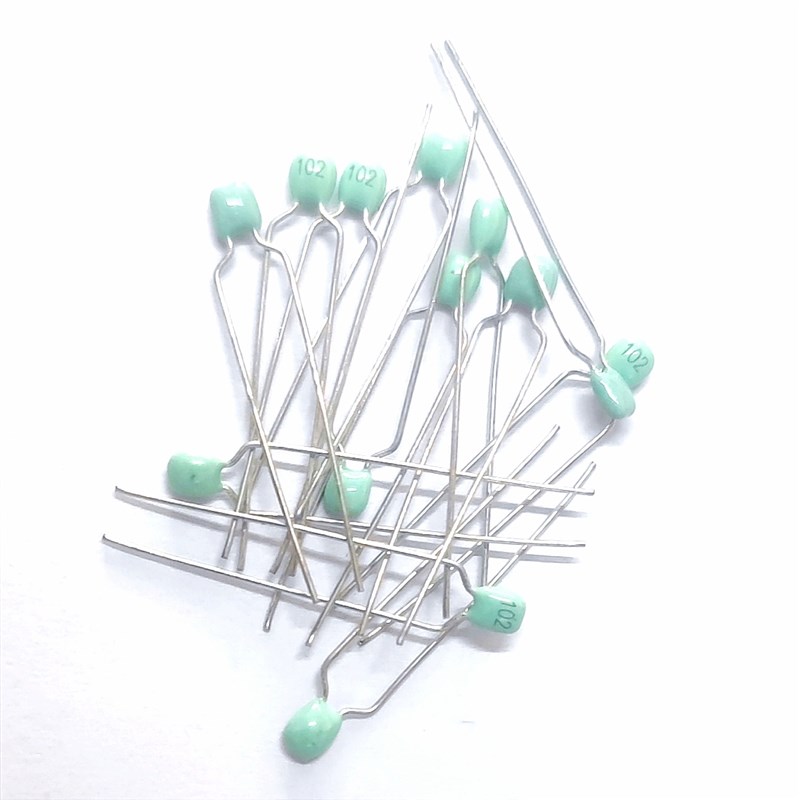 【500只】63V/102/104/0.1UF直插独石电容绿色长脚