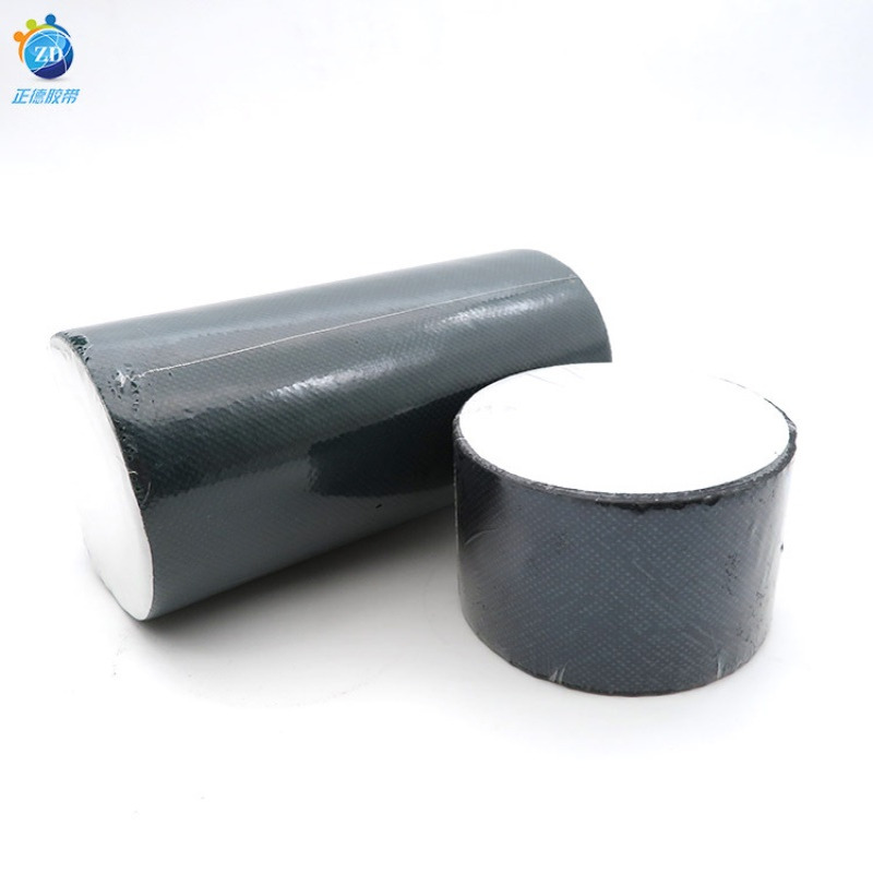 人造草坪胶带草坪接缝自粘胶带黑色固定草皮胶带高粘布基胶带批发