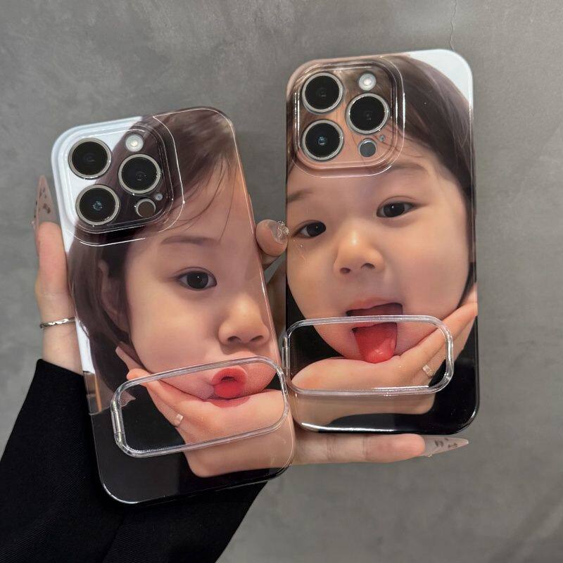 苹果14plus吐舌可爱女孩手机壳硬iPhone16荣耀400少女心s30带镜子支架15ProMax适用13菲林12高级感华为Pura70