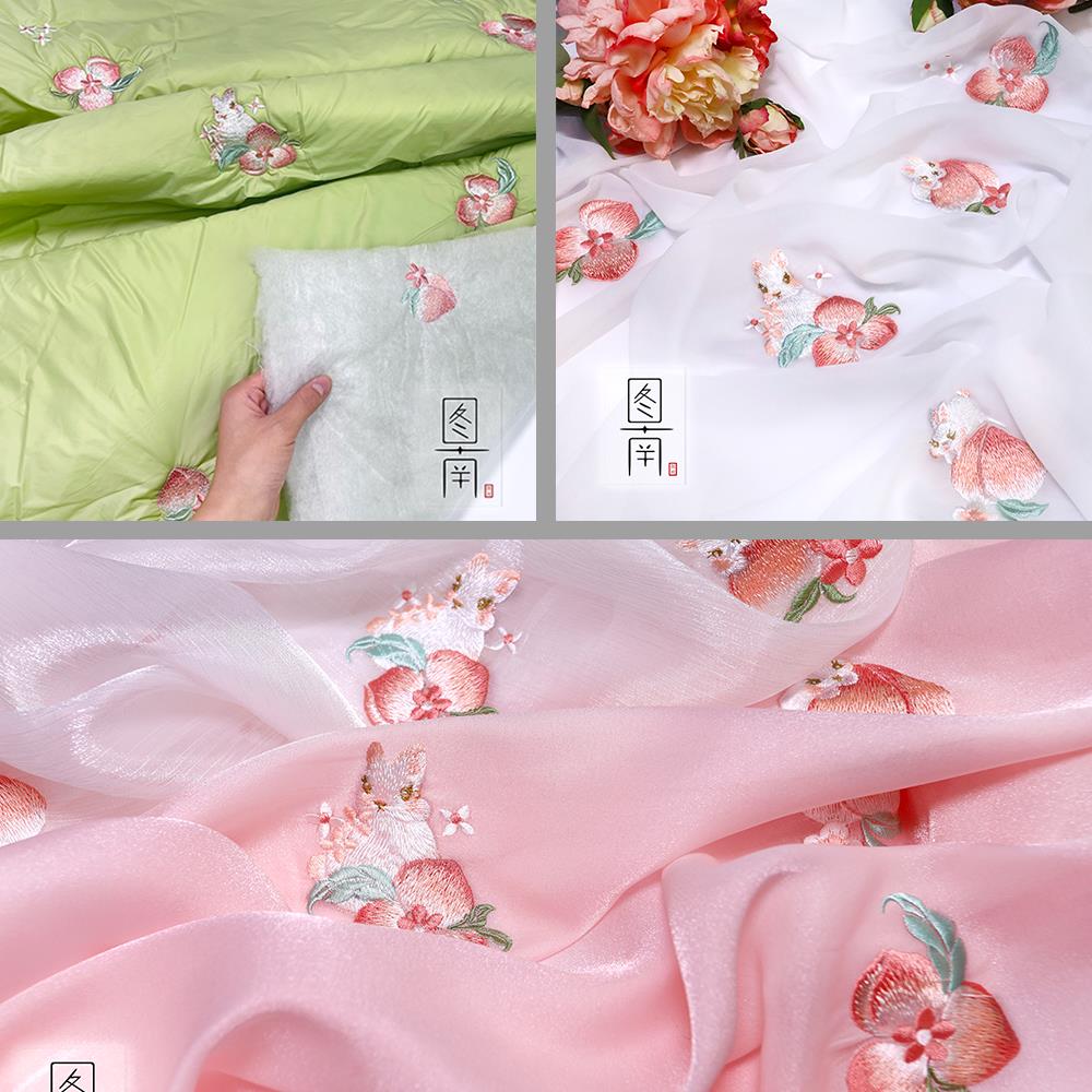 图南原创蜜桃兔绣花扬州纱面料国风380T尼丝纺棉服布料童装毕设