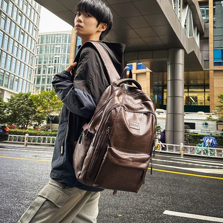 双肩包个性欧美复古大容量通勤商务男士背包女双肩旅游轻便大学生