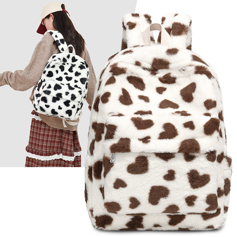 大容量奶牛学生背包女双肩旅游轻便百搭慵懒风书包毛绒新款可爱高