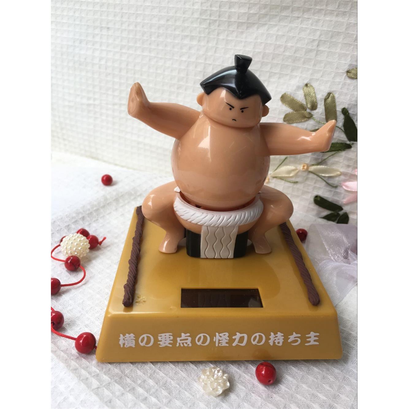 相扑手太阳能娃娃车载居家摆件摇头公仔竞技相扑创意车载内饰摆件