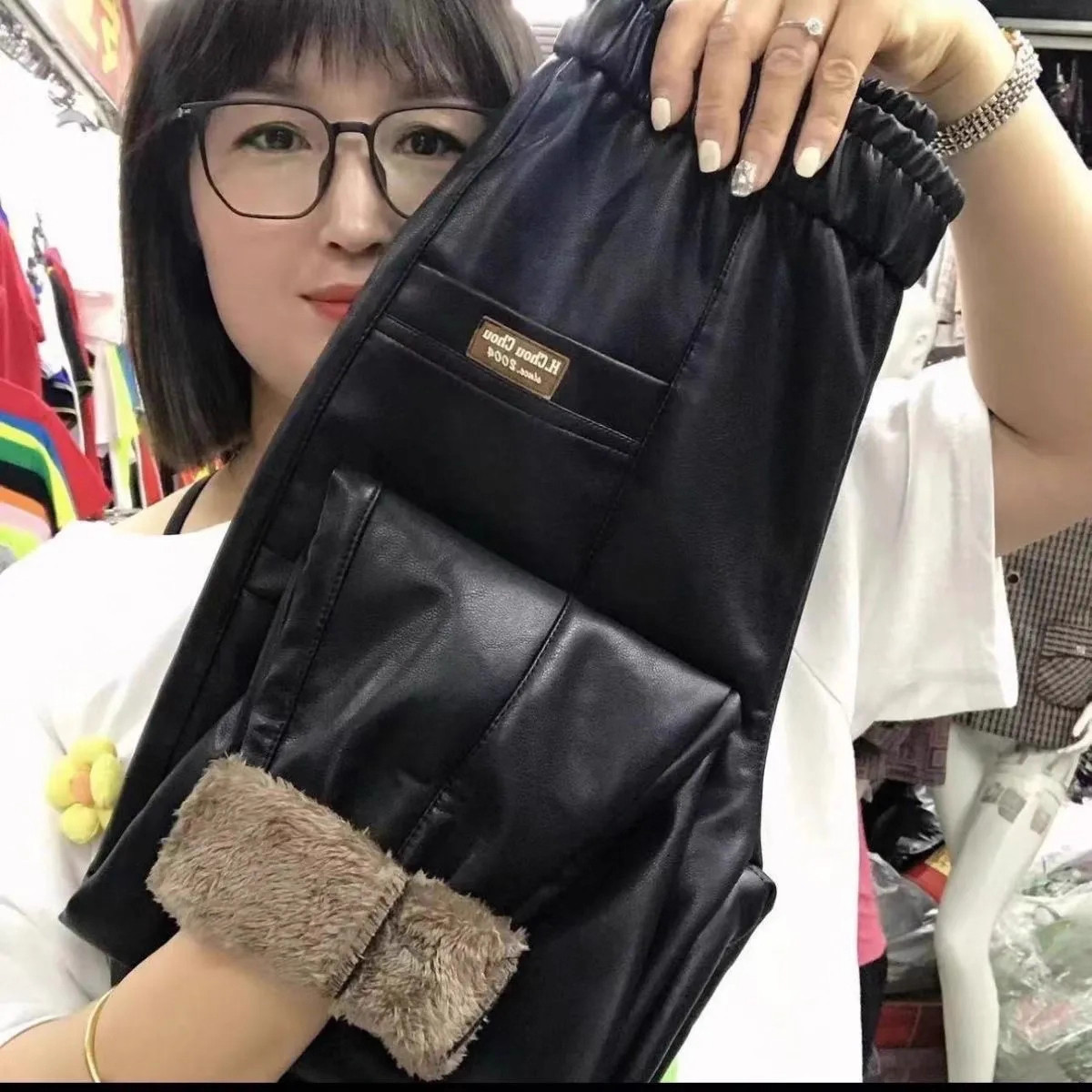 情侣加厚羊羔绒防水高腰皮裤
