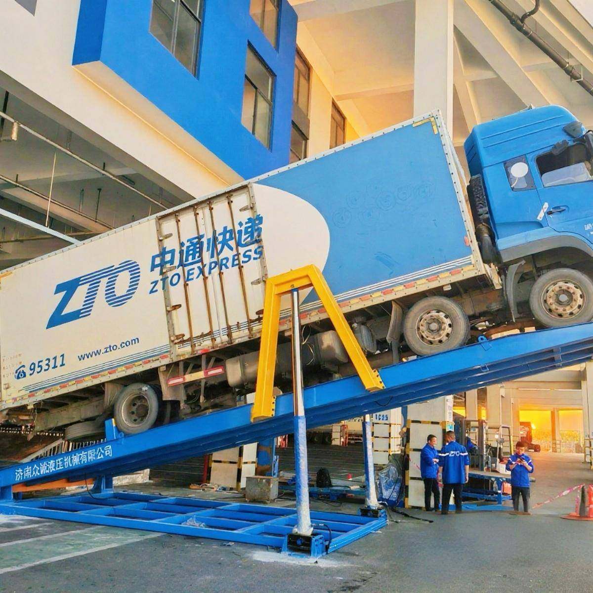 快递卸车机；适用9米6/4米2货车自动卸货平台液压翻板生产厂家,搬运/仓储/物流设备,其他起重搬运设备,淘宝优惠券,粉丝福利购,淘宝优惠卷