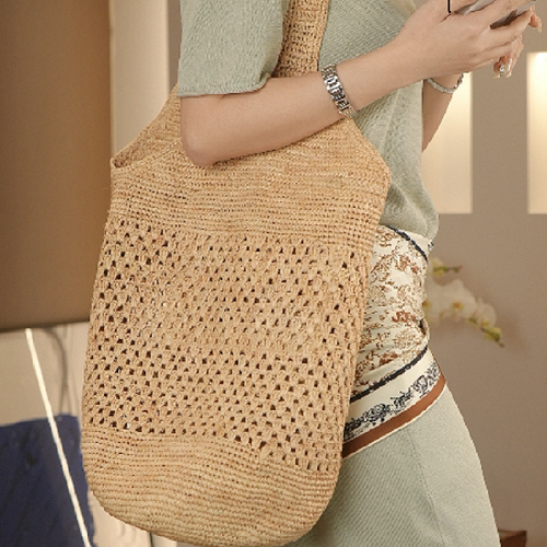 夏日ins镂空拉菲草编织菱格水桶包大容量沙滩度假风单肩托特包