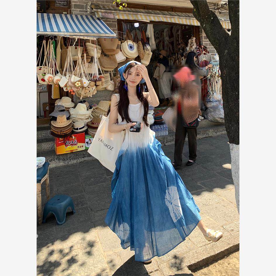 海边度假蓝色扎染吊带连衣裙女夏季法式气质收腰大摆裙A字长裙子