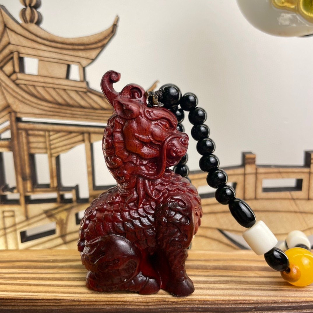 紫檀瑞兽麒麟手把件木雕文玩把玩件雕刻木质工艺品礼品7公分