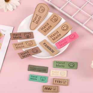 供应服饰皮牌超纤皮标压印LOGO服装 商标皮牌制作 皮标牛仔裤