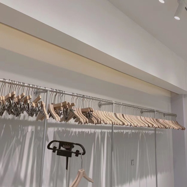 男服装店展示架银色铁艺侧挂货架上墙吊顶陈列架悬挂衣架婚纱吊架