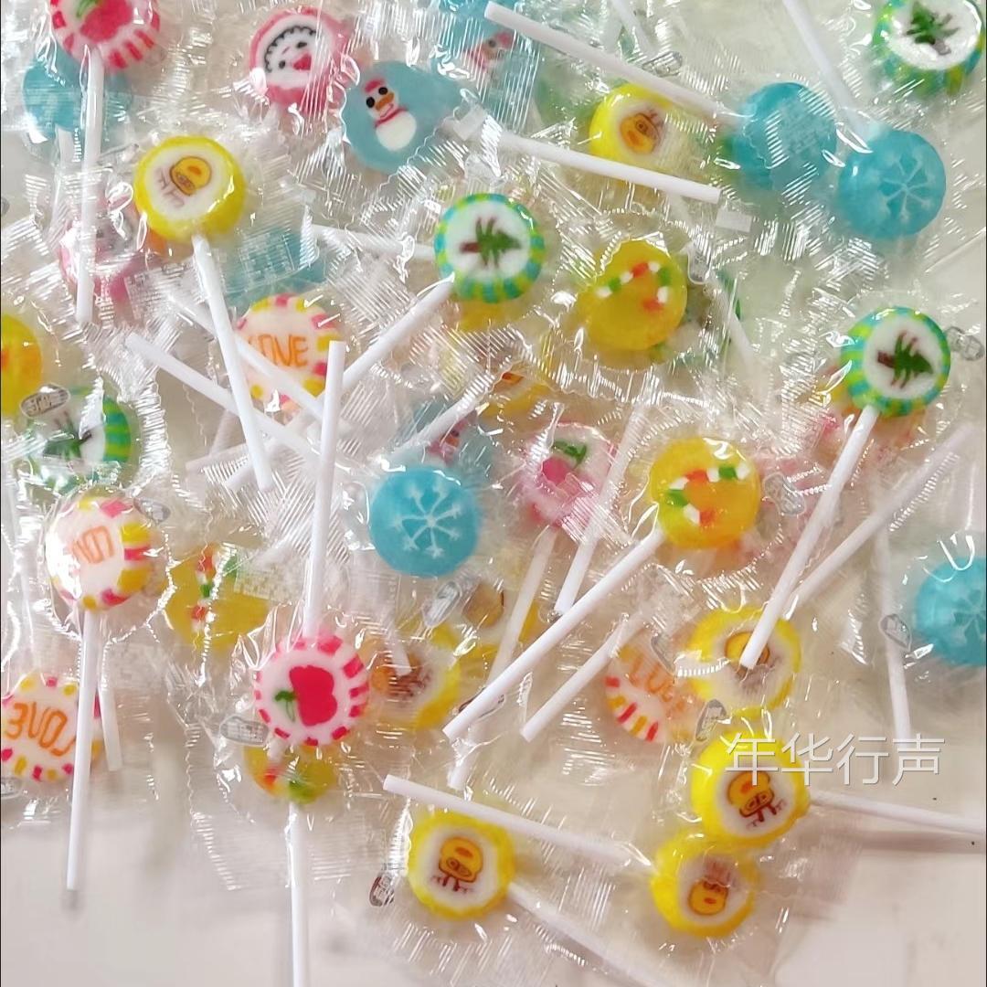 卡通手工水果切片棒棒糖水果味硬糖可爱糖袋装短棒散装圣诞节糖果