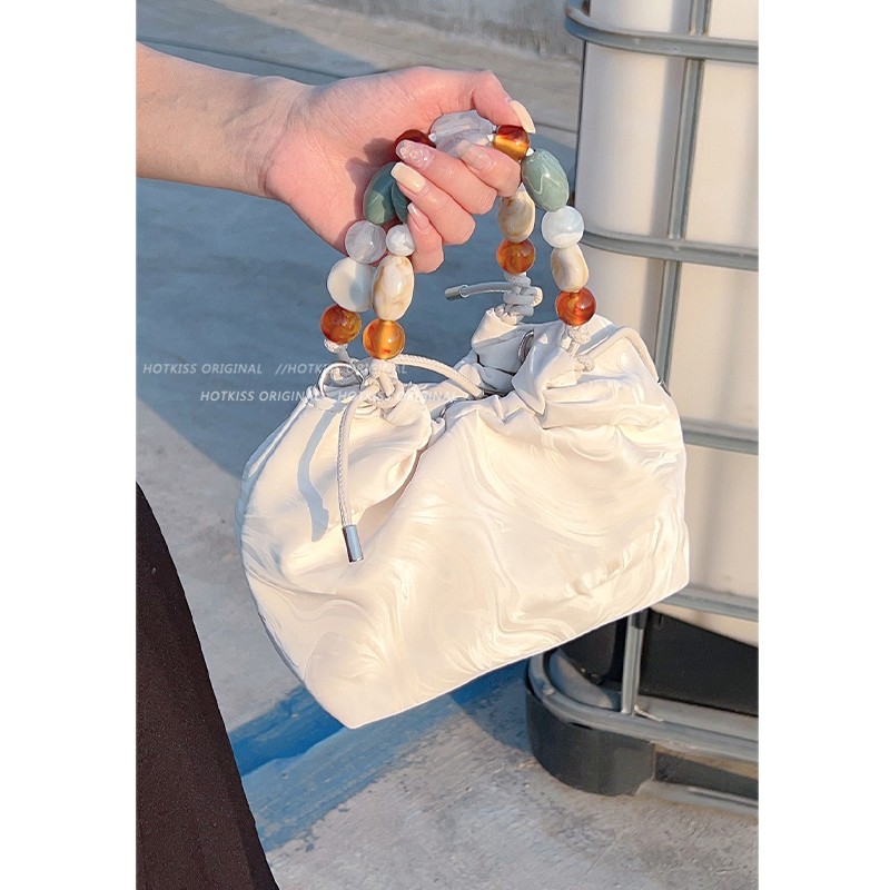 新中式国风包包女2024新款夏季单肩斜挎包超火手提褶皱云朵水桶包