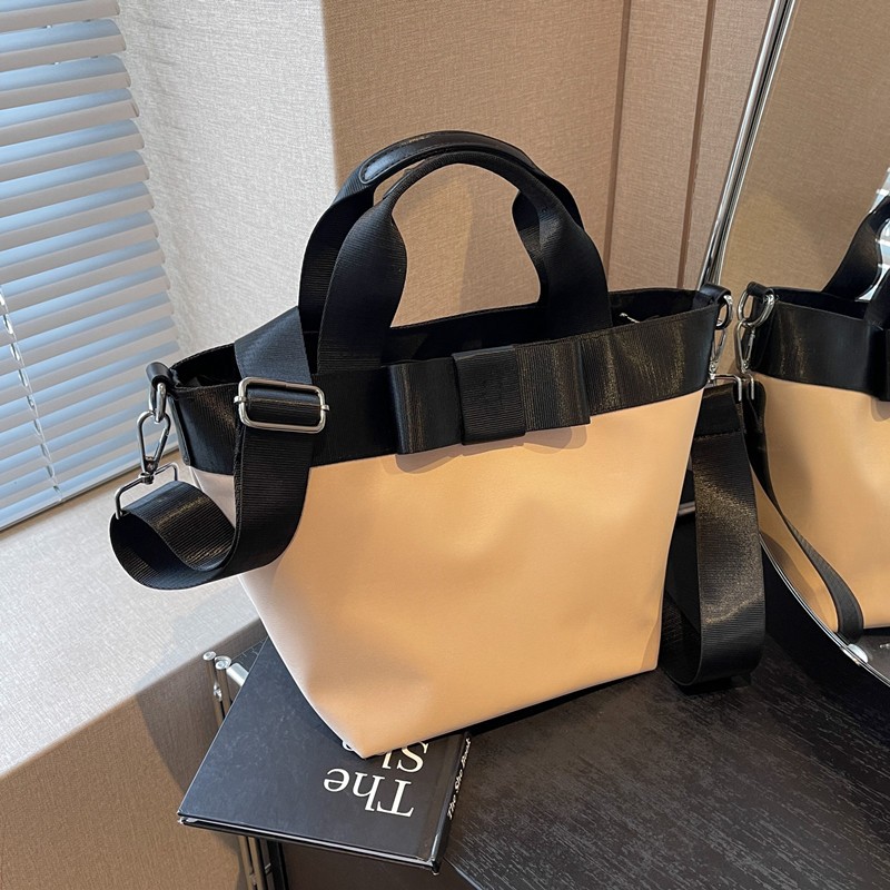 菜篮子水桶包包女2025新款大容量通勤手提包小众百搭尼龙布斜挎包