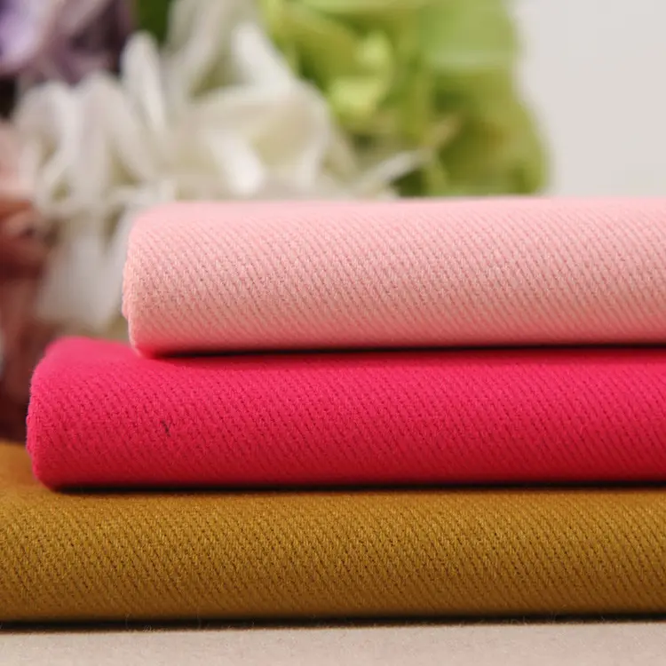 77斜纹磨毛布  粗斜纱卡面料 秋冬外套休闲裤子布料