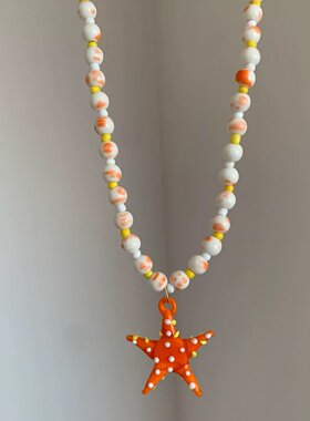波西米亚度假风橙色小海星串珠吊坠项链轻奢小众显白锁骨链配饰女