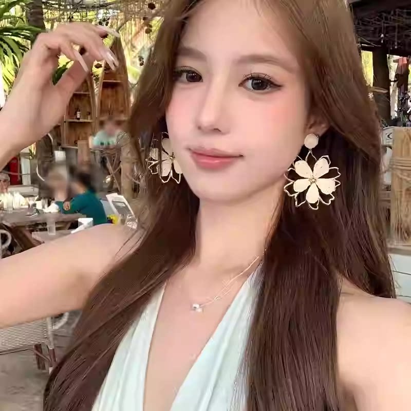 【蜜桃茶】草编太阳花朵度假耳环女2025新款夸张海边配饰独特绝美