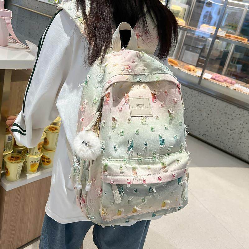 新品帆布书包女初中生小学生三到六年级高颜值双肩包中学生大学生