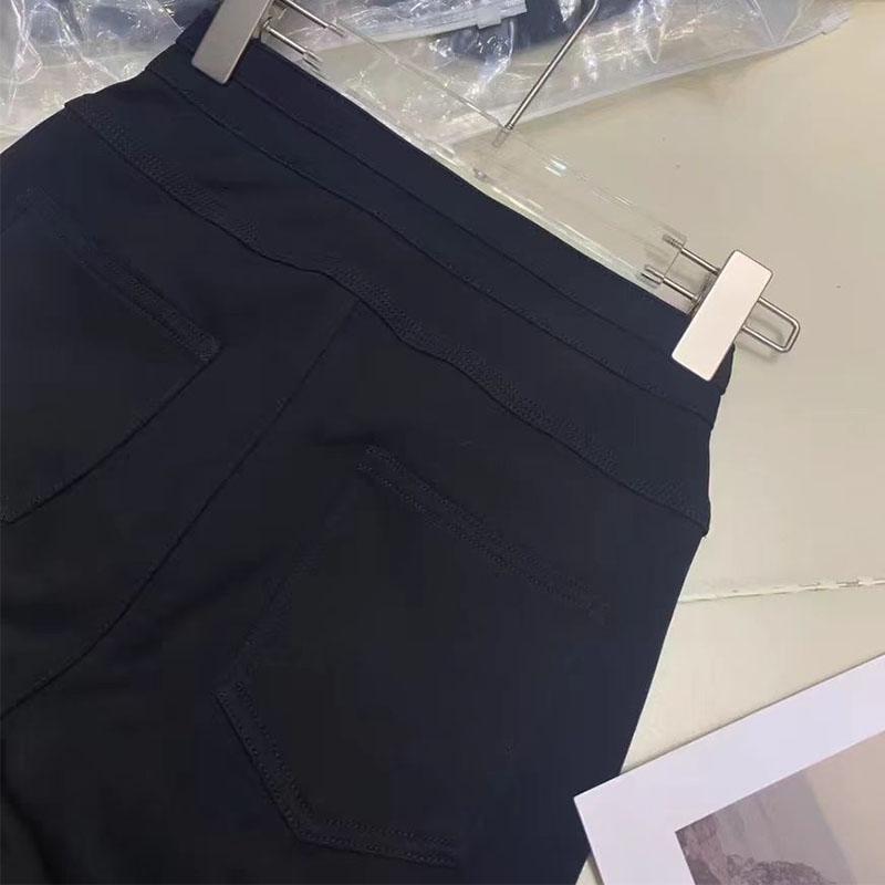 推荐深圳南油2026冬季新款腰头纽扣紧身显瘦黑色铅笔裤小脚裤百搭