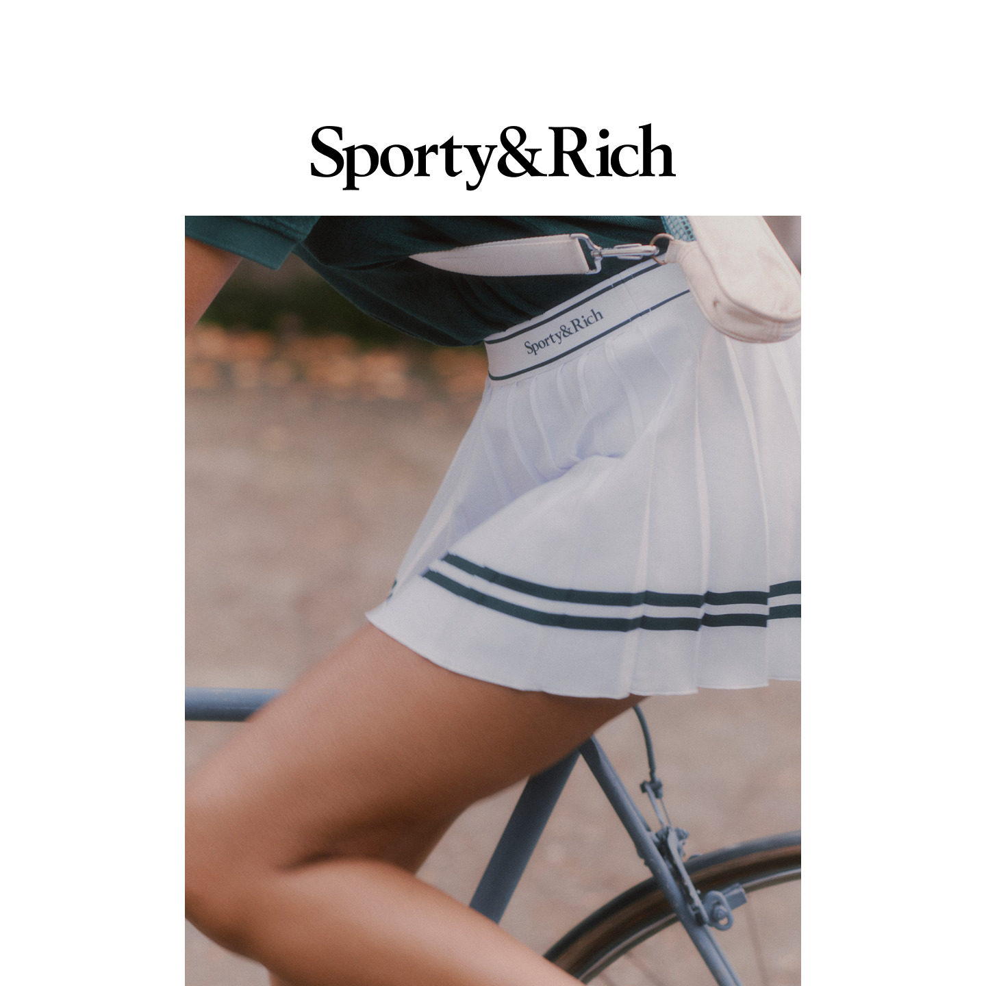 [甄选八折]Sporty&Rich 女士网球风撞色条纹百褶半身裙短裙带底裤