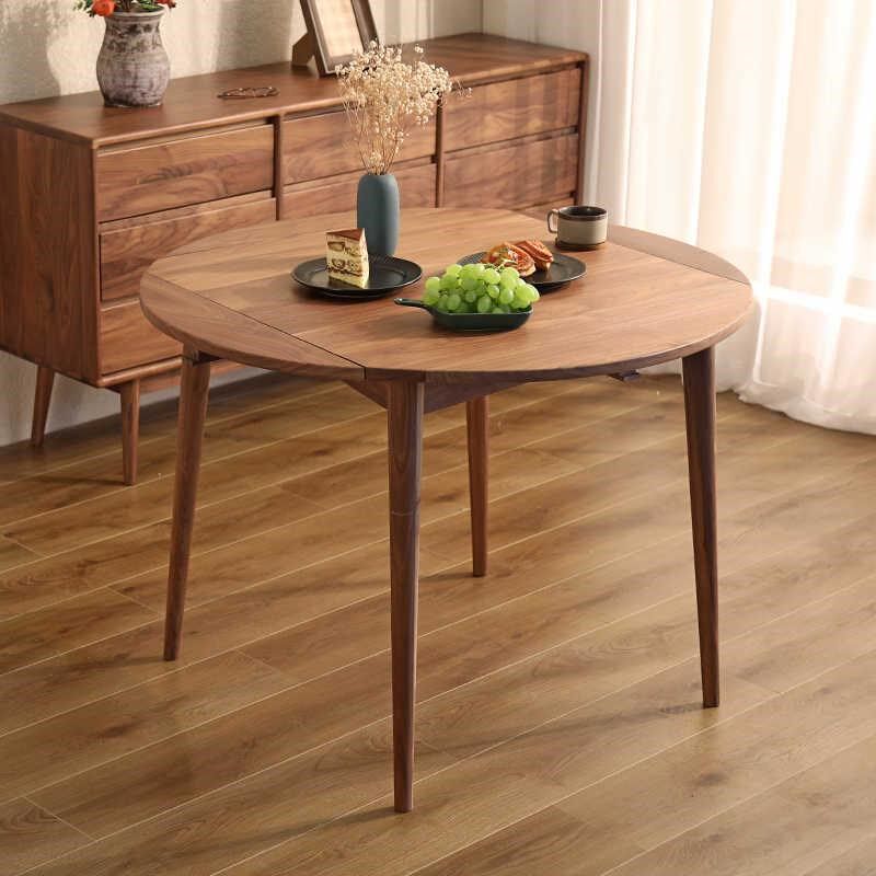 北欧实木餐桌黑胡桃木圆桌原木伸缩可折叠餐桌家用小户型圆形饭桌