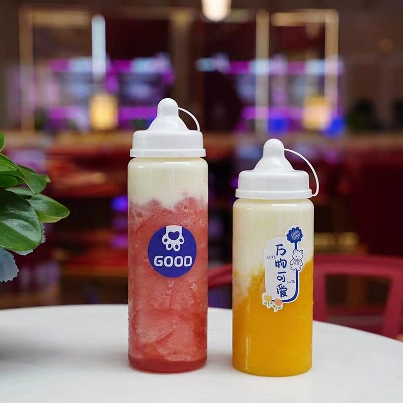 直销网红创意可爱奶嘴盖奶茶带盖一次性商用PET塑料果汁饮料胖胖
