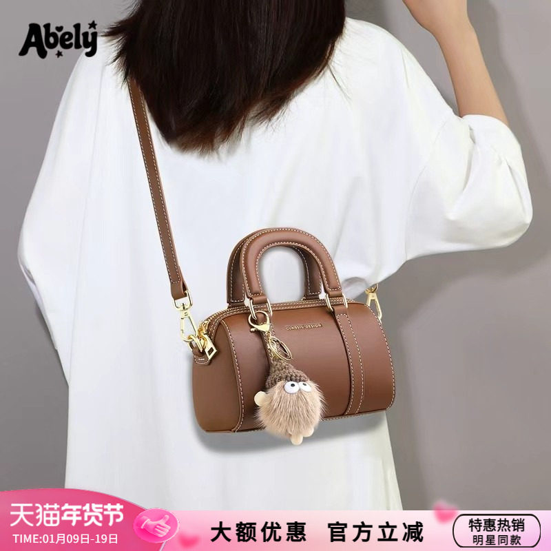 Abely阿贝莉手提包2025新款真皮斜挎枕头包女包圆筒单肩波士顿包,箱包皮具/热销女包/男包,通用款女包,淘宝优惠券,粉丝福利购,淘宝优惠卷